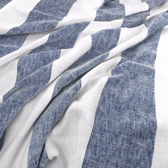 Muted Delft blue and white broad bands across a softly folded woven fabric