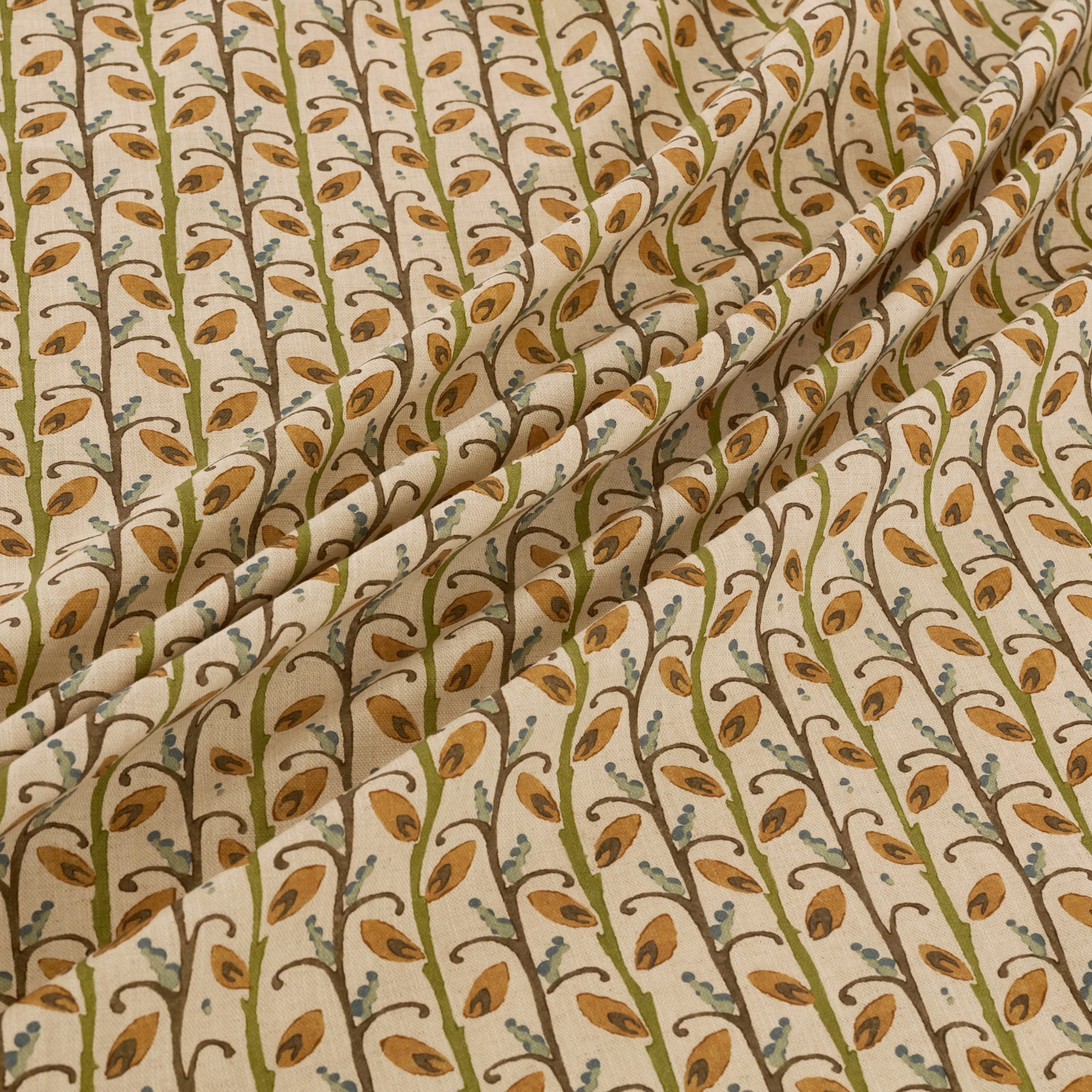 Cream botanical fabric with amber leaves, olive stems and blue-grey details