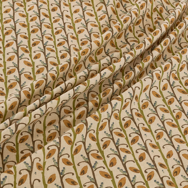 Cream botanical fabric with amber leaves, olive stems and blue-grey details