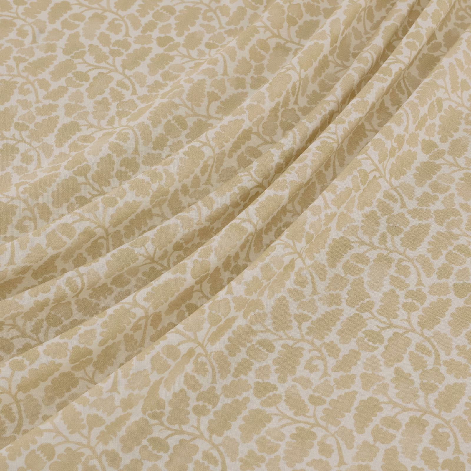 Warm oyster and cream floral damask with scrolling motifs gathered into soft folds