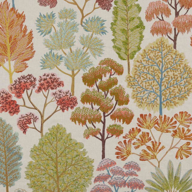 Warm ivory fabric with rust, teal and olive woodland trees in a detailed botanical pattern
