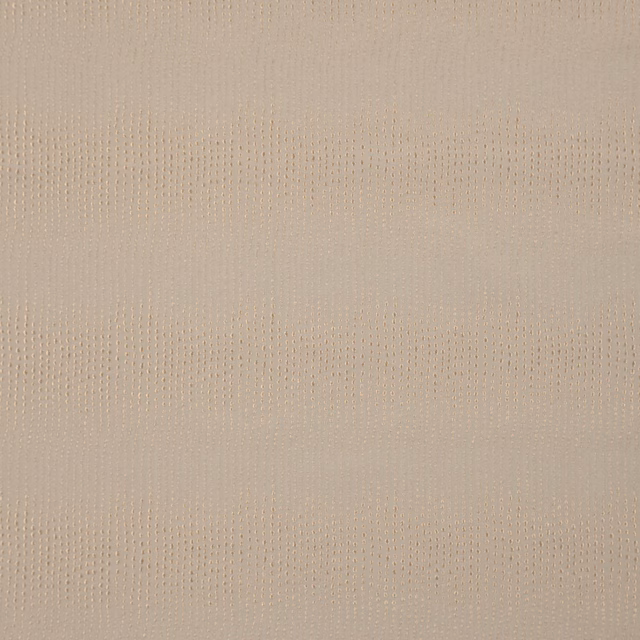 Close-up of pale birch beige fabric with a fine, lightly raised woven texture