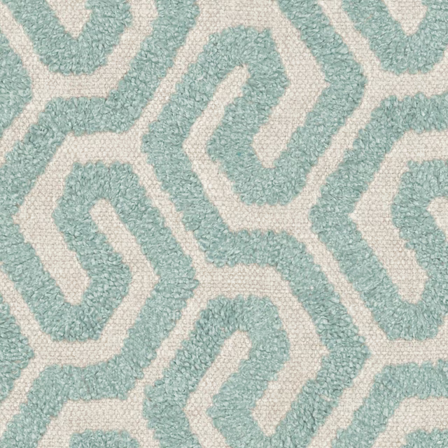 Ivory and seafoam teal woven fabric with nubby meandering geometric lines