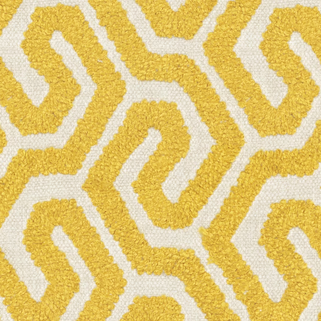 Textured sunshine-yellow looping geometric pattern on an ivory fabric ground