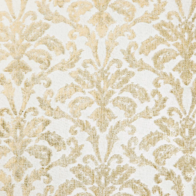 Ivory woven fabric with softly distressed honey damask leaves and scrolling foliage