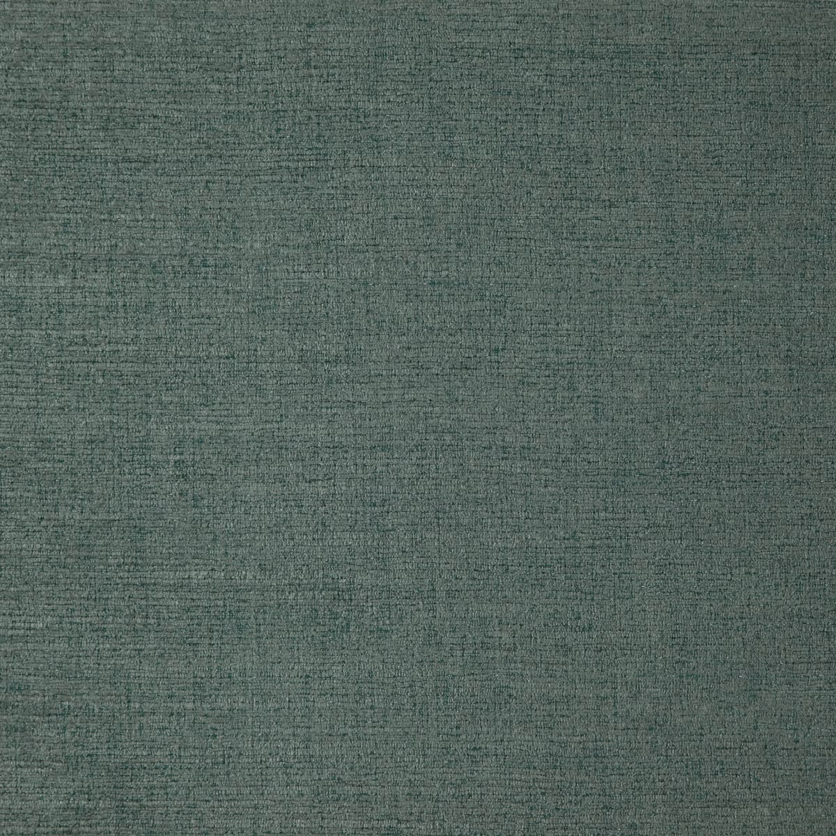 Close view of muted blue-teal fabric with fine irregular woven texture