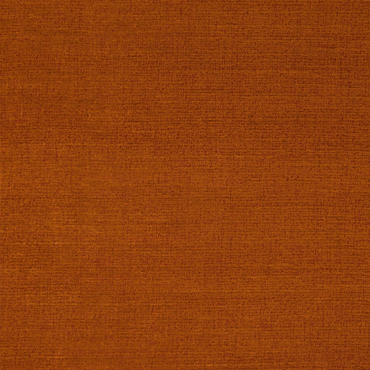 Warm paprika-rust fabric showing a fine, irregular horizontal woven texture