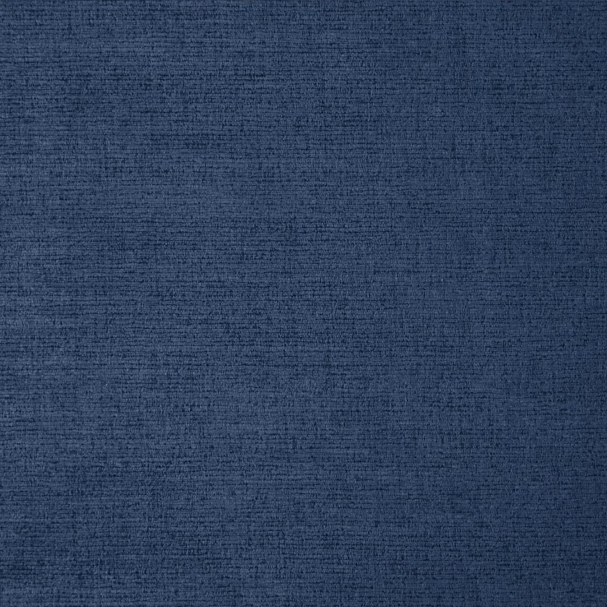 Deep indigo woven swatch with fine horizontal slub and softly mottled texture