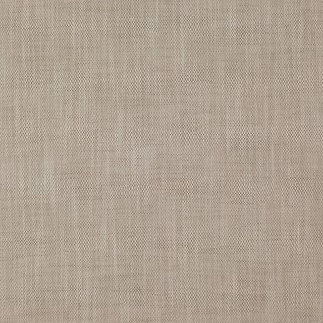 Warm nougat taupe fabric with a fine irregular woven texture