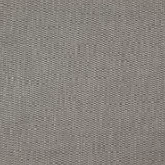 Close-up of warm fog-grey Baltic fabric showing a fine, tightly woven plain texture
