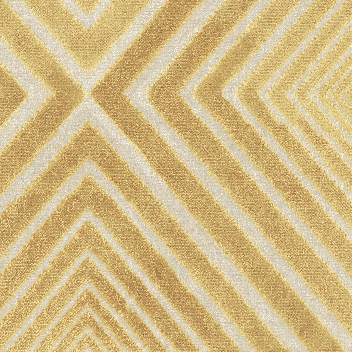 Close-up of straw-gold and ivory chevrons in a softly textured woven surface