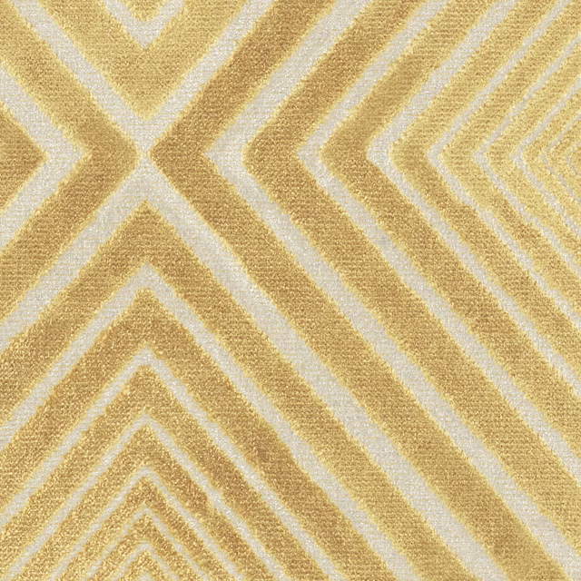 Close-up of straw-gold and ivory chevrons in a softly textured woven surface