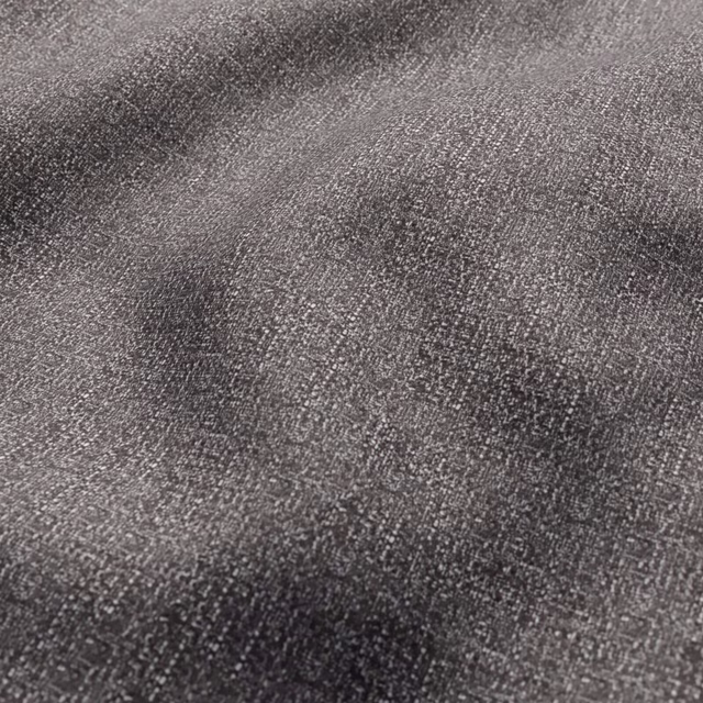 Close-up of dark charcoal Benbecula fabric with mottled woven texture