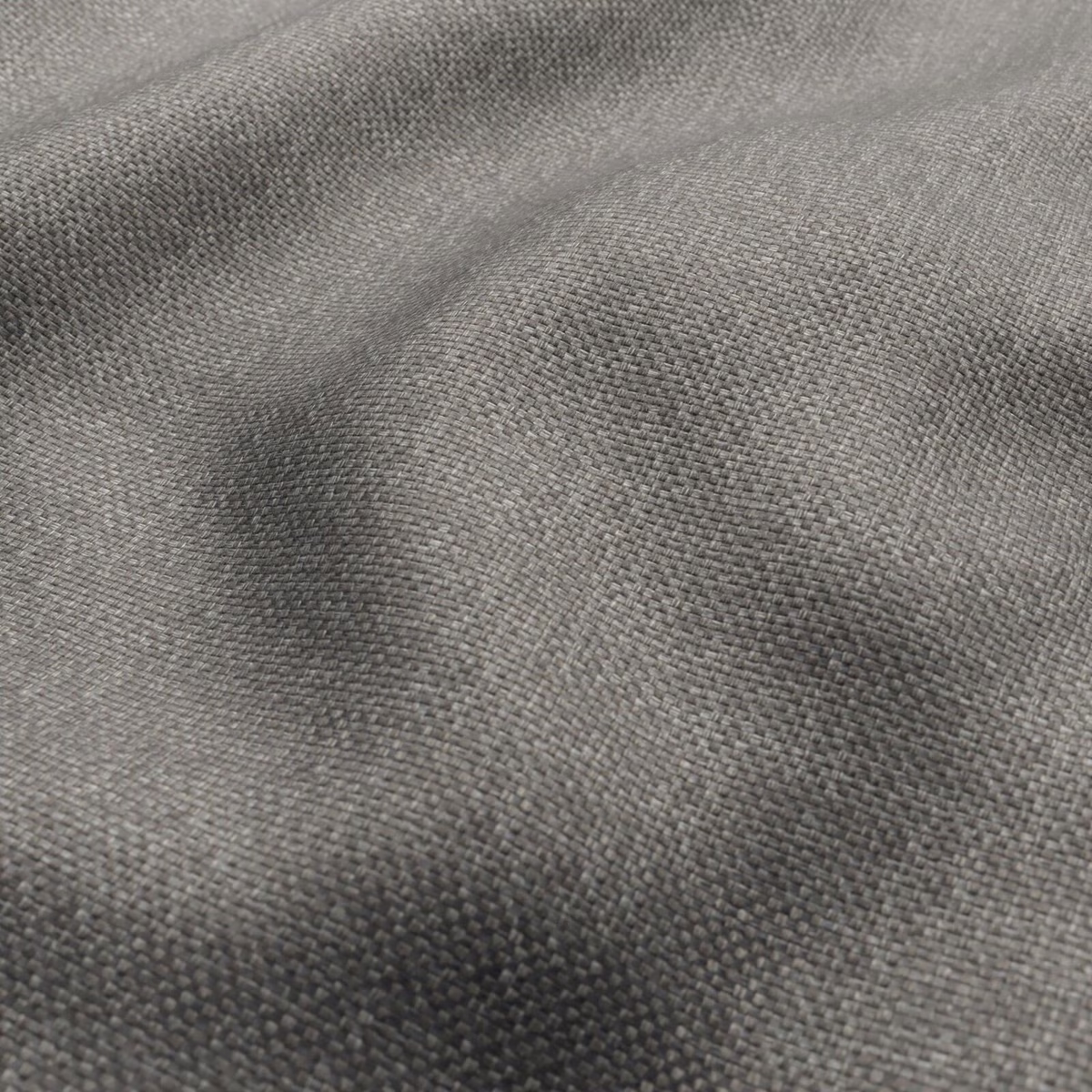 Close-up of warm cappuccino taupe fabric with a fine, softly irregular weave