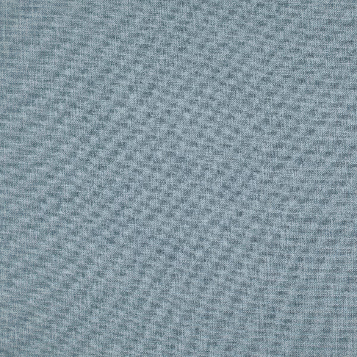 Muted blue-grey close-up showing a fine woven surface with delicate tonal flecks