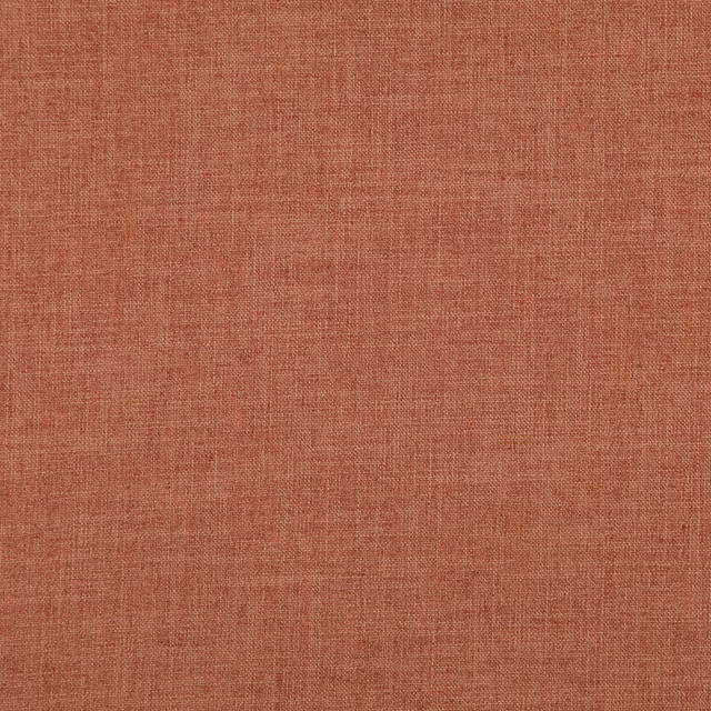 Close-up of warm brick terracotta fabric with a fine crosshatched woven texture