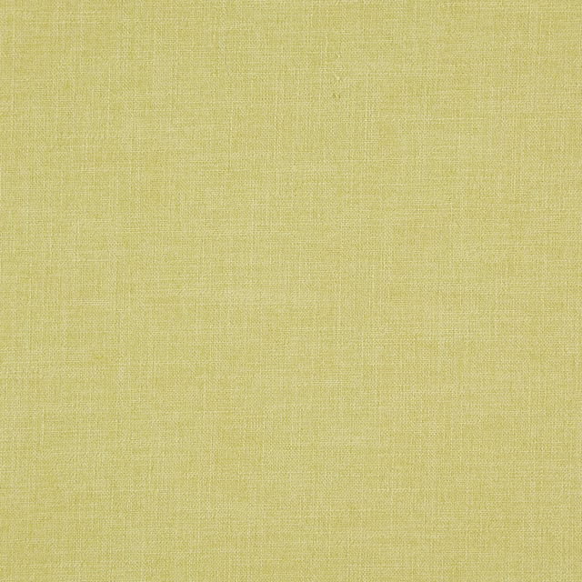 Soft pistachio yellow-green plain weave showing a fine crosshatch texture