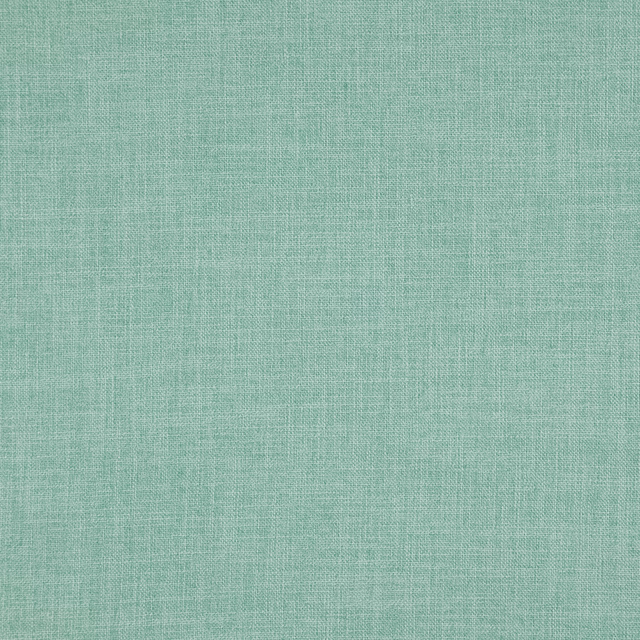 Close-up of pale aquamarine teal fabric with a fine, softly mottled woven texture