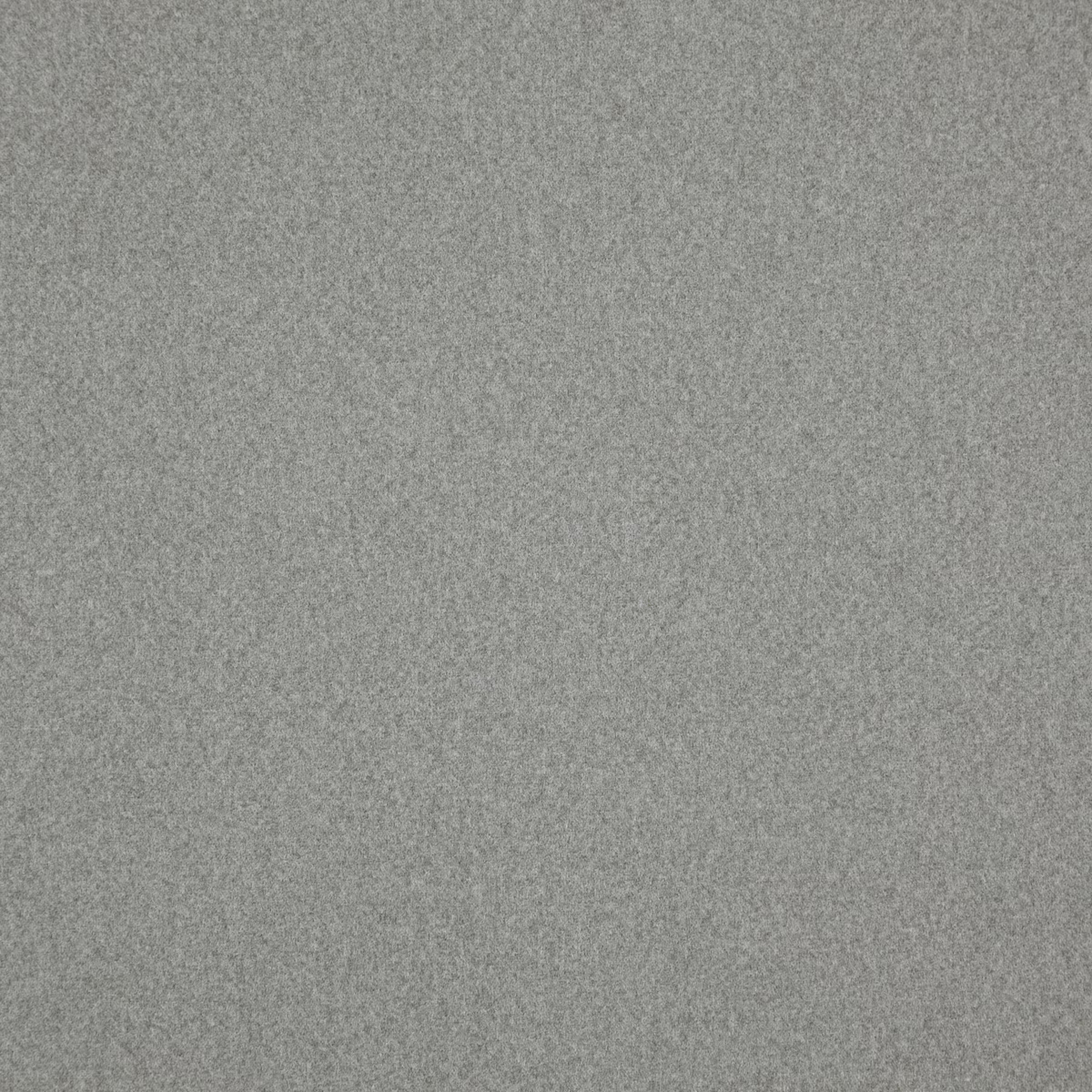 Close view of 01 Cinder’s softly mottled, cool grey woven surface
