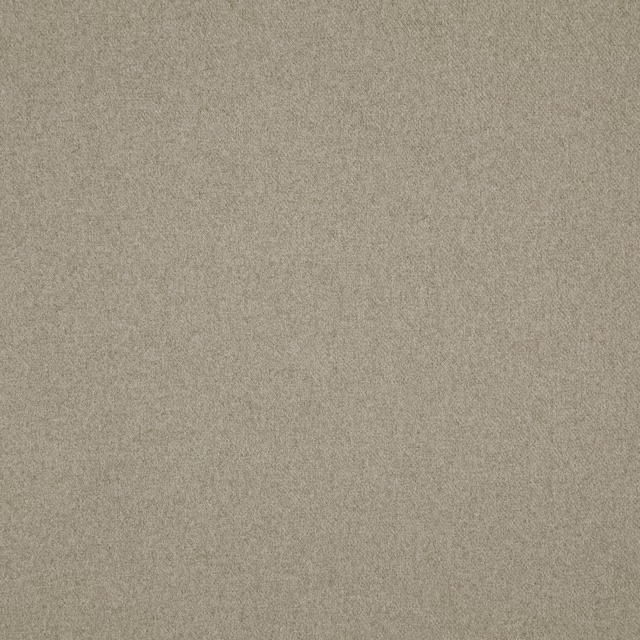 Warm ecru-beige Brodie textile showing a fine, softly mottled woven surface