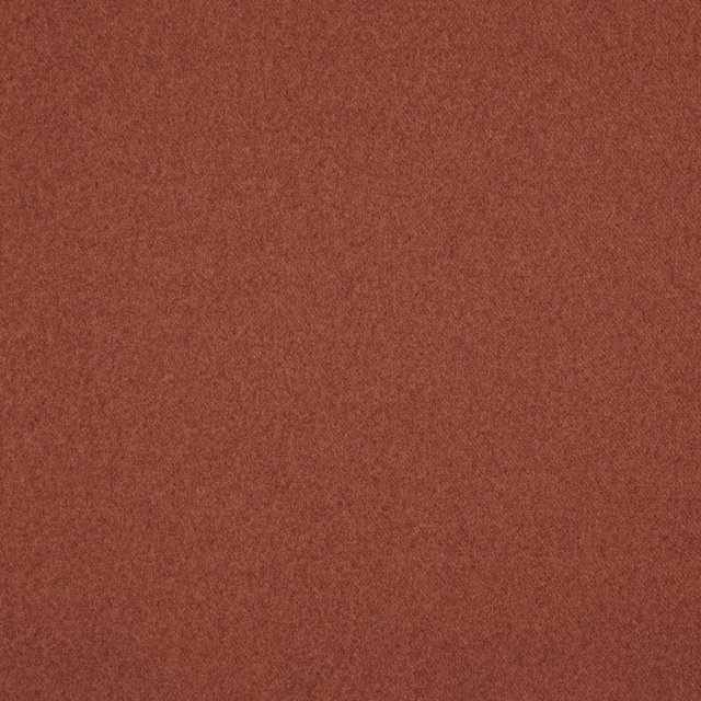 Russet terracotta Brodie fabric showing a soft, fine-grain textured surface