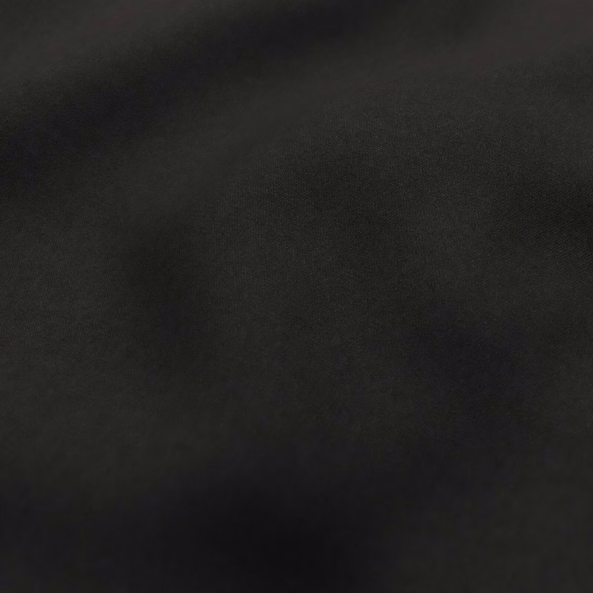 Deep black Bute textile showing a fine weave and subtle mottled surface sheen