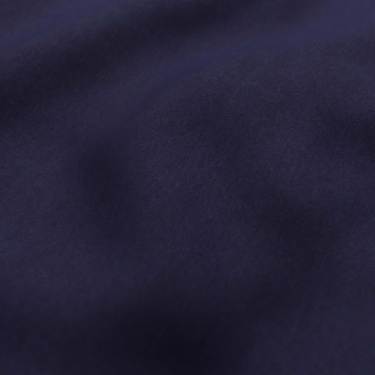 Deep ink-blue textile with a softly lustrous, close-textured surface