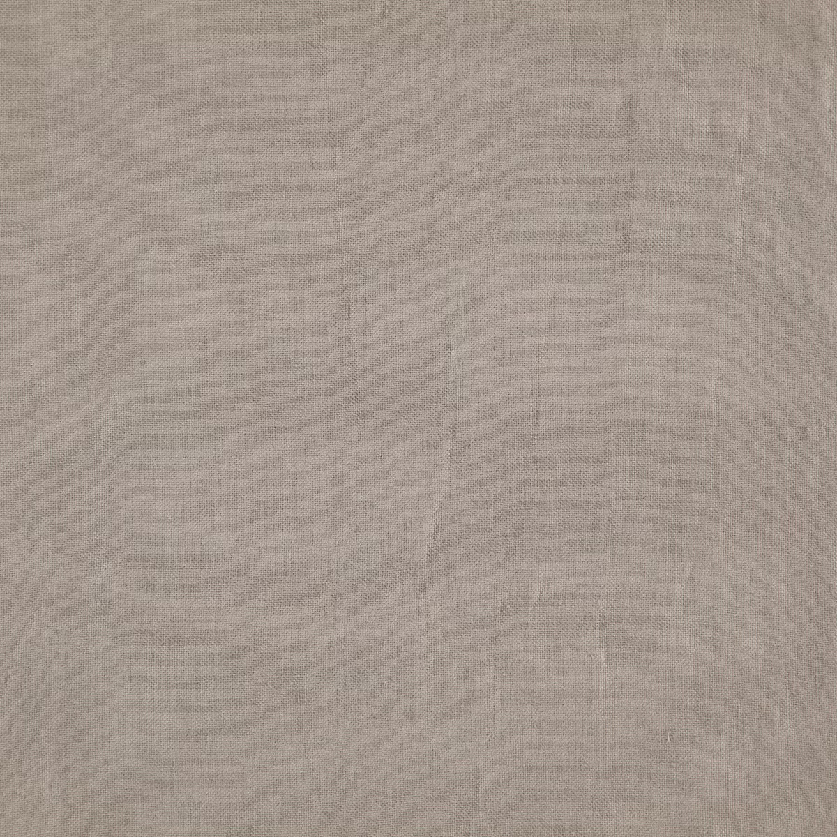 Close view of cool zinc-grey plain weave with fine vertical slubs and soft texture
