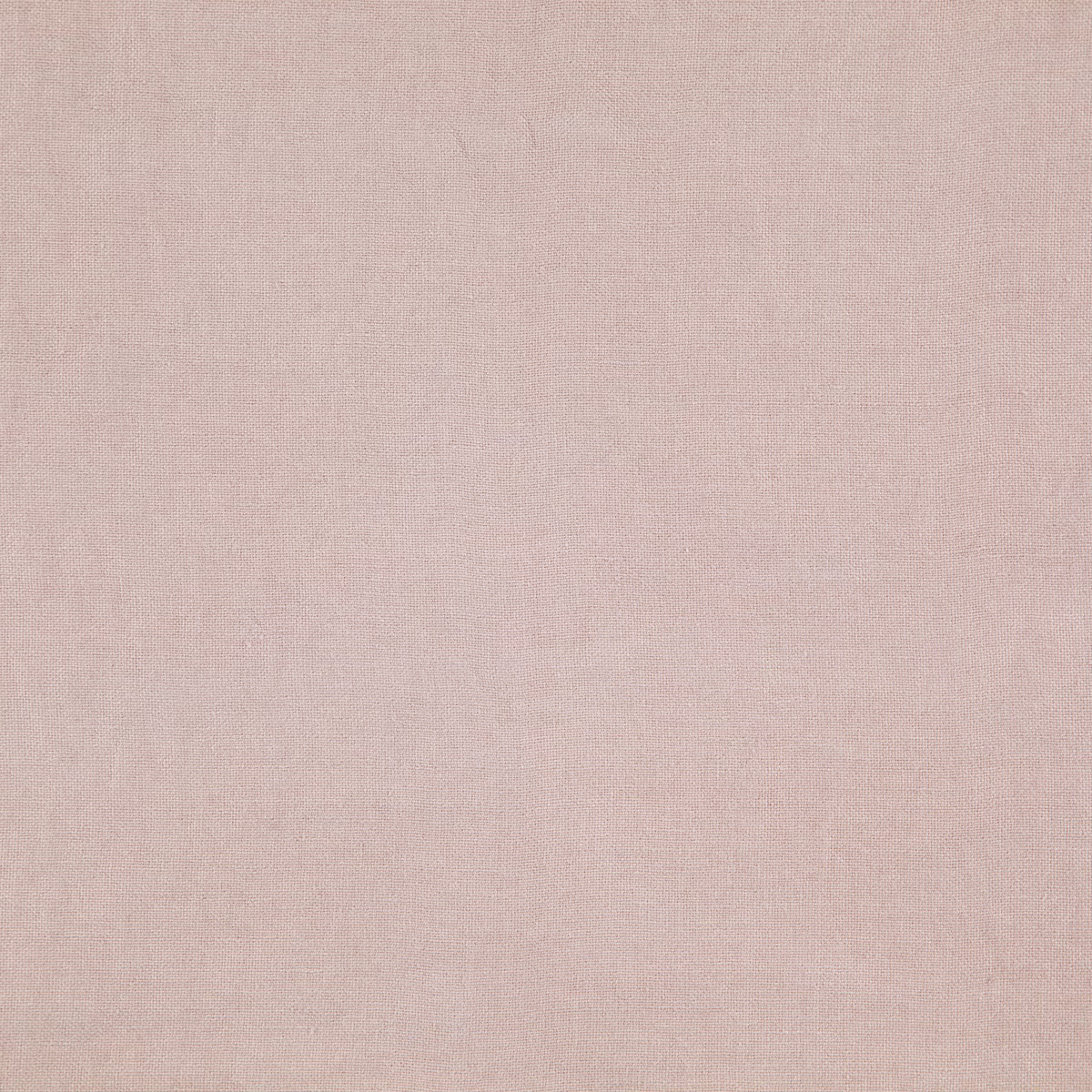 Close-up of pale blush-pink Cairn fabric with a fine, even woven texture