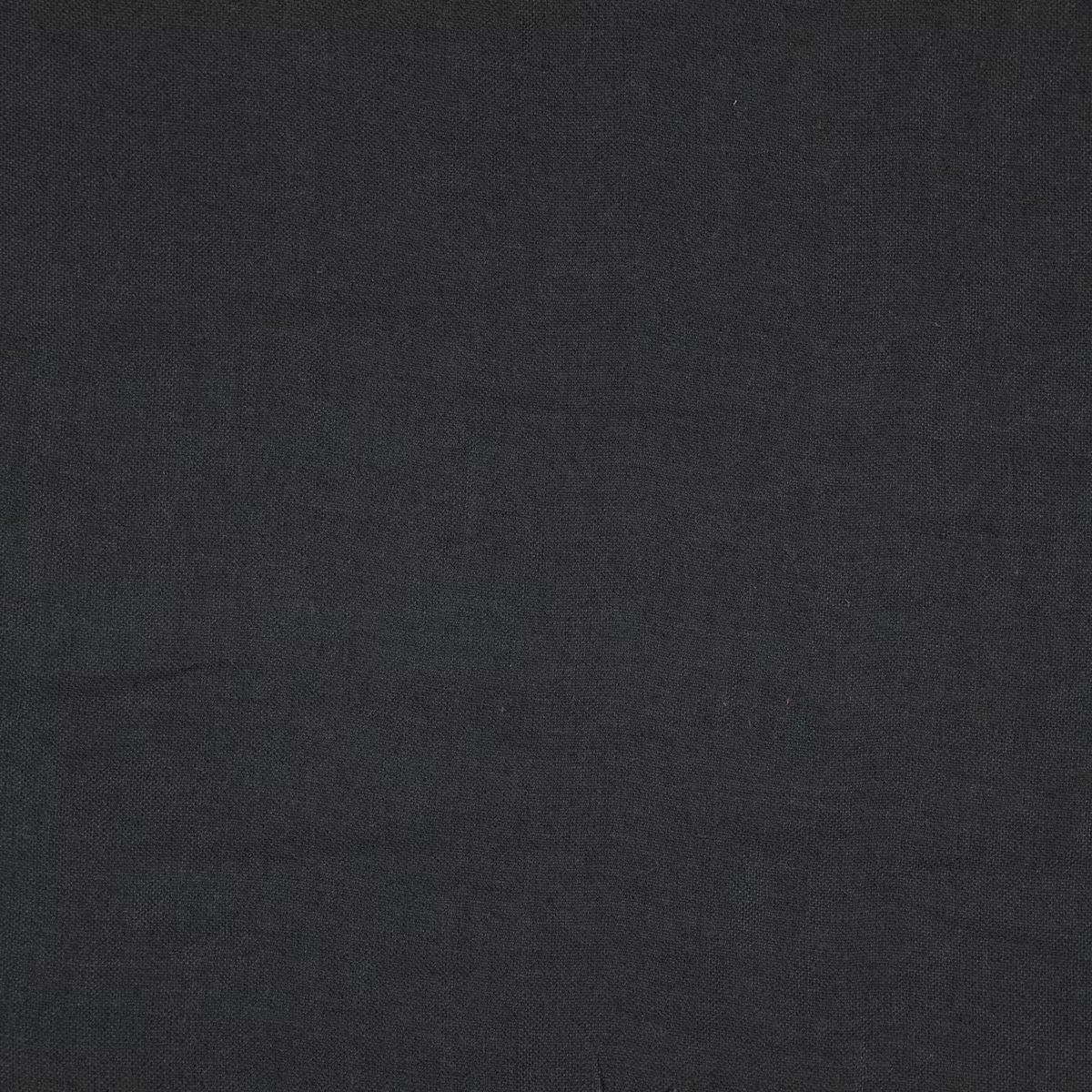 Near-black charcoal Cairn textile with a fine, subtly mottled woven surface