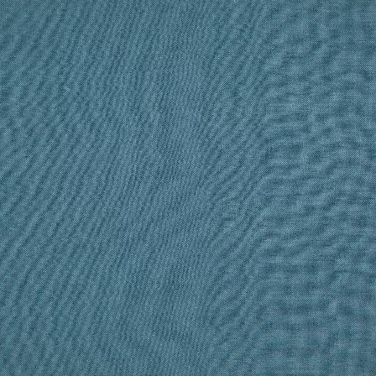 Muted blue-teal plain weave with fine tonal texture across the Cairn swatch