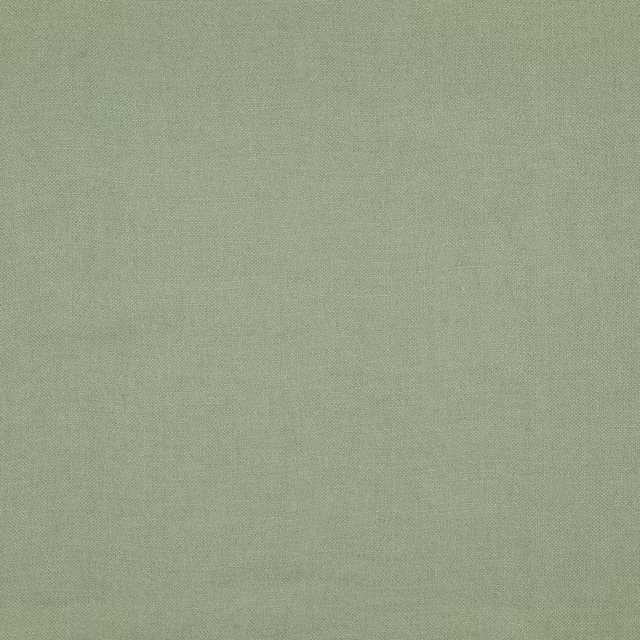 Close view of muted olive-green fabric with a fine, subtly tonal plain weave