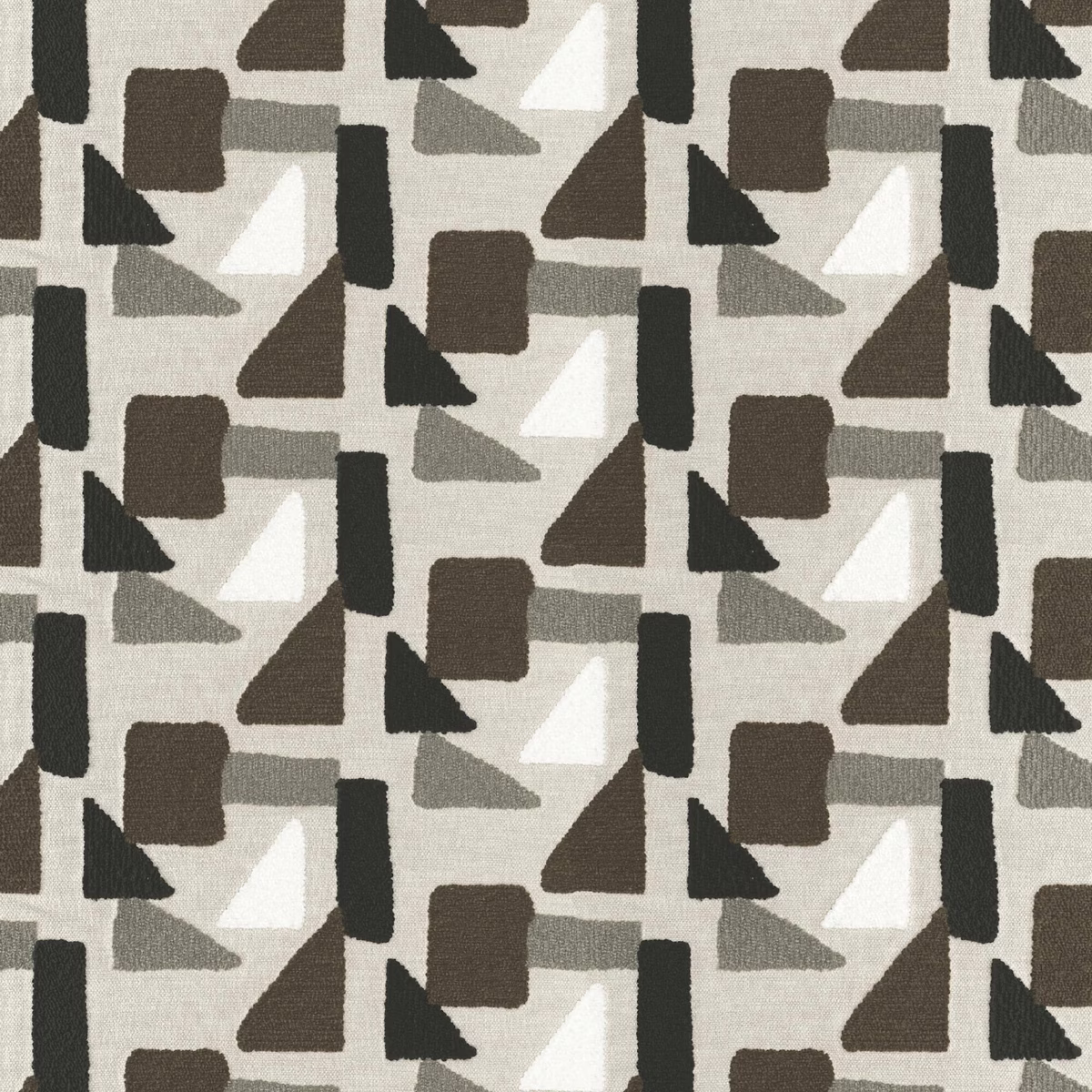 Warm calico geometric fabric with charcoal, brown, grey and white abstract shapes
