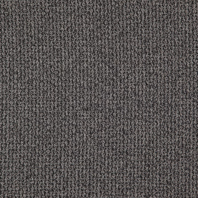 Close-up of dark peppercorn-grey fabric with a dense, irregular woven texture