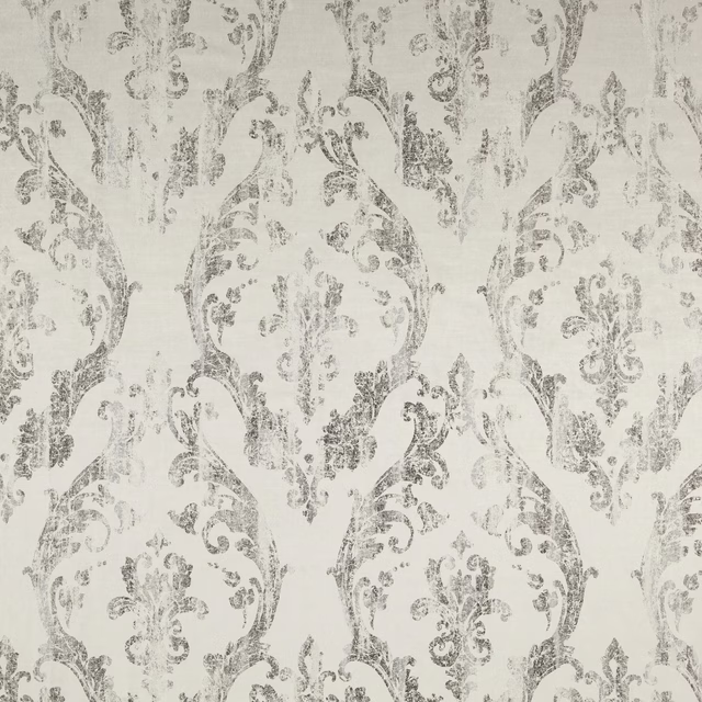 Pale ivory Catalina fabric with softly distressed grey damask scrolls in a repeating layout