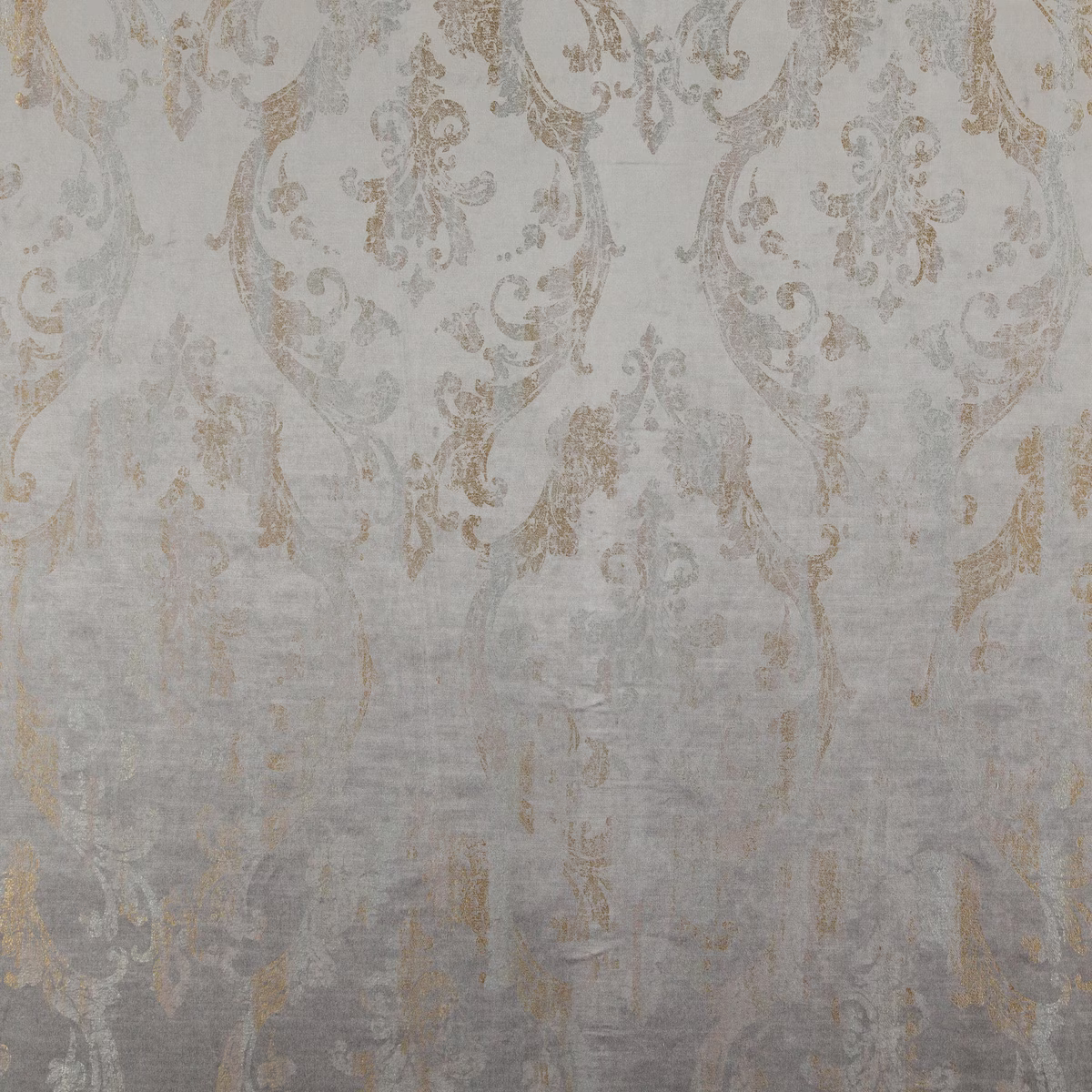 Pale blue-grey woven fabric with faded taupe damask scrolls and distressed texture
