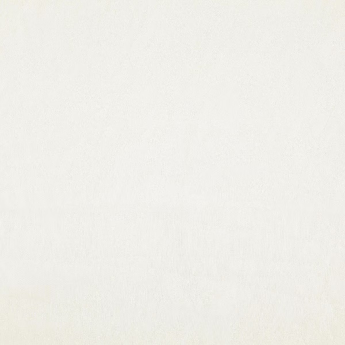 Warm ivory parchment fabric with faint cloudy tonal shifts and a fine plain surface