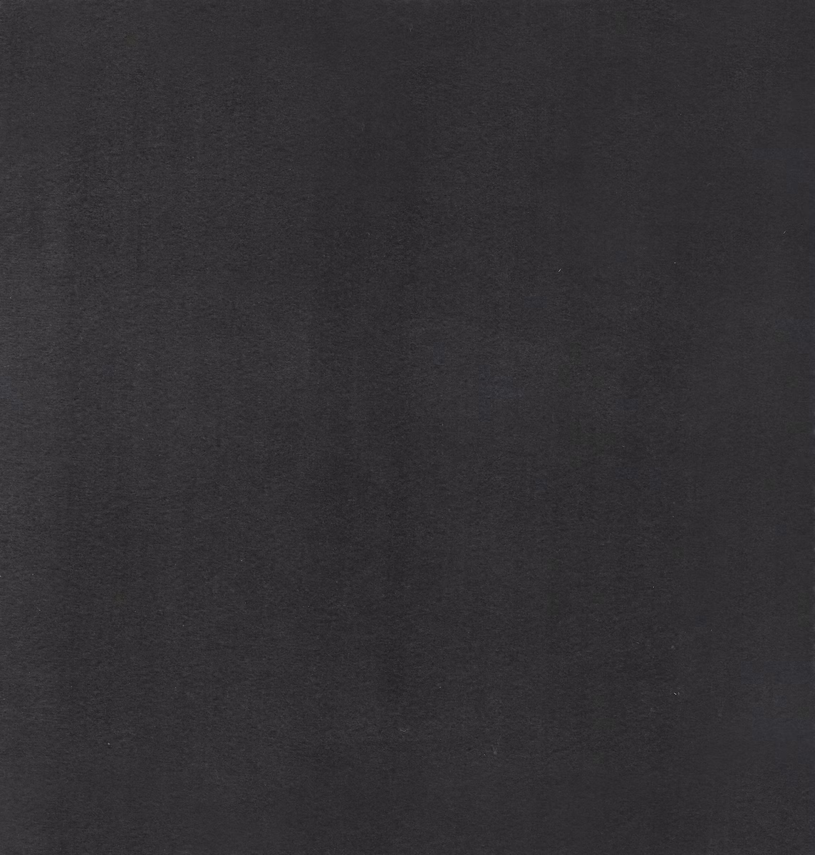 Near-black charcoal textile with a cool lavender cast and subtly mottled surface