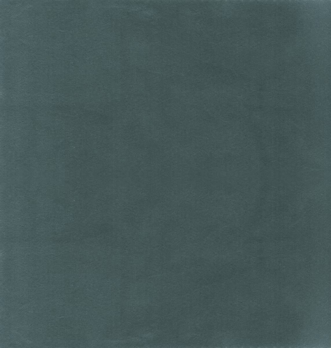 Close view of smoky blue-grey plain fabric with a soft, low nap