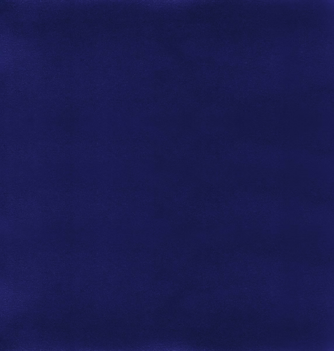 Deep grape-purple fabric with subtle nap shading across a plain, close-textured surface