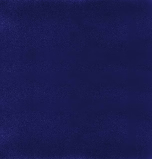 Deep grape-purple fabric with subtle nap shading across a plain, close-textured surface