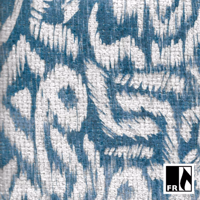 Muted denim-blue woven fabric with chalky ivory abstract markings and raised texture