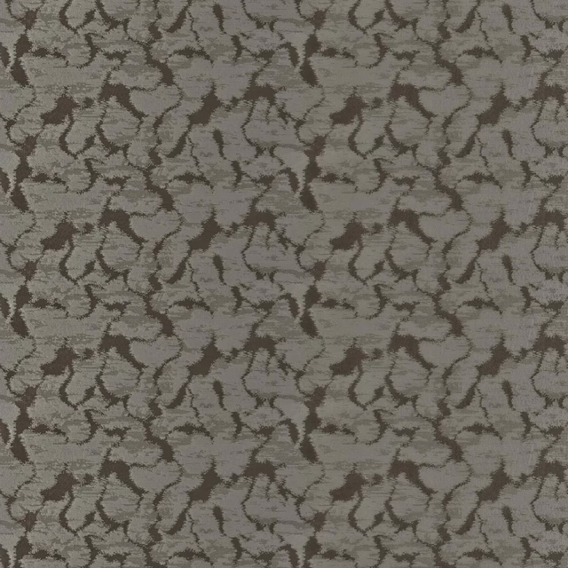 Grey-taupe woven Cortez fabric with charcoal-brown curling marks and mottled texture