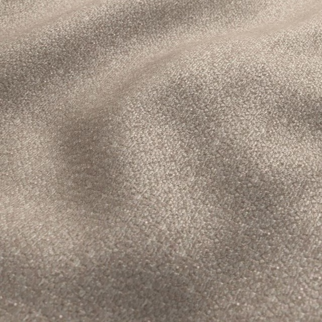Close-up of nubby blush taupe textile with soft tonal shading