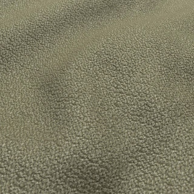 Close-up of muted moss olive fabric with a dense, softly nubby woven texture