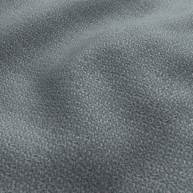 Close-up of muted greyed teal fabric with a dense, softly nubby textured surface