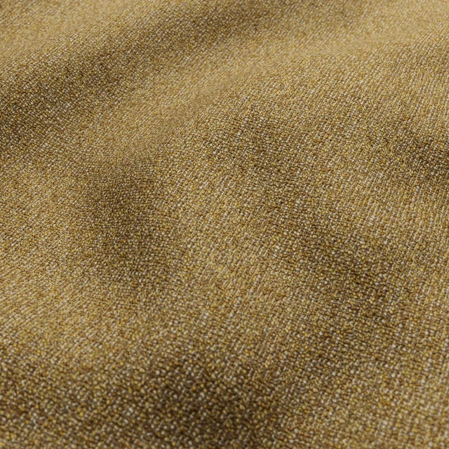 Close-up of warm golden-brown Creran fabric with dense pebbled woven texture