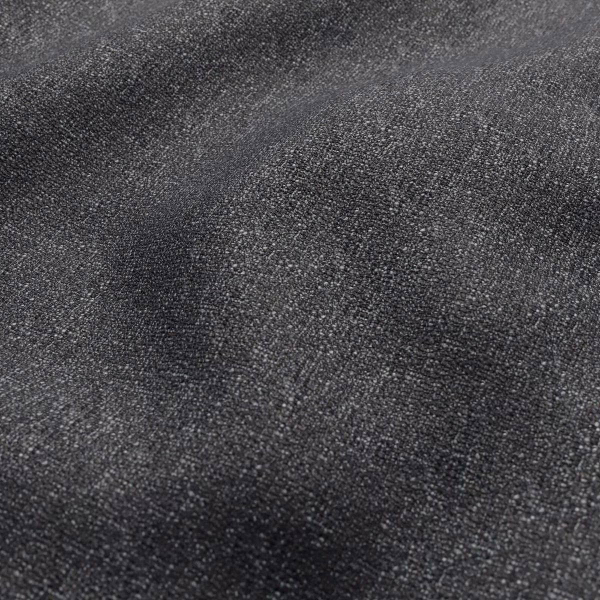 Deep soot charcoal woven fabric with fine nubby texture and subtle tonal variation