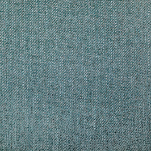 Close-up of muted blue-teal woven fabric with fine tonal flecks