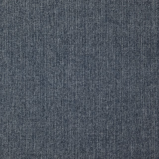 Close-up of cool indigo blue-grey fabric with a fine variegated woven texture